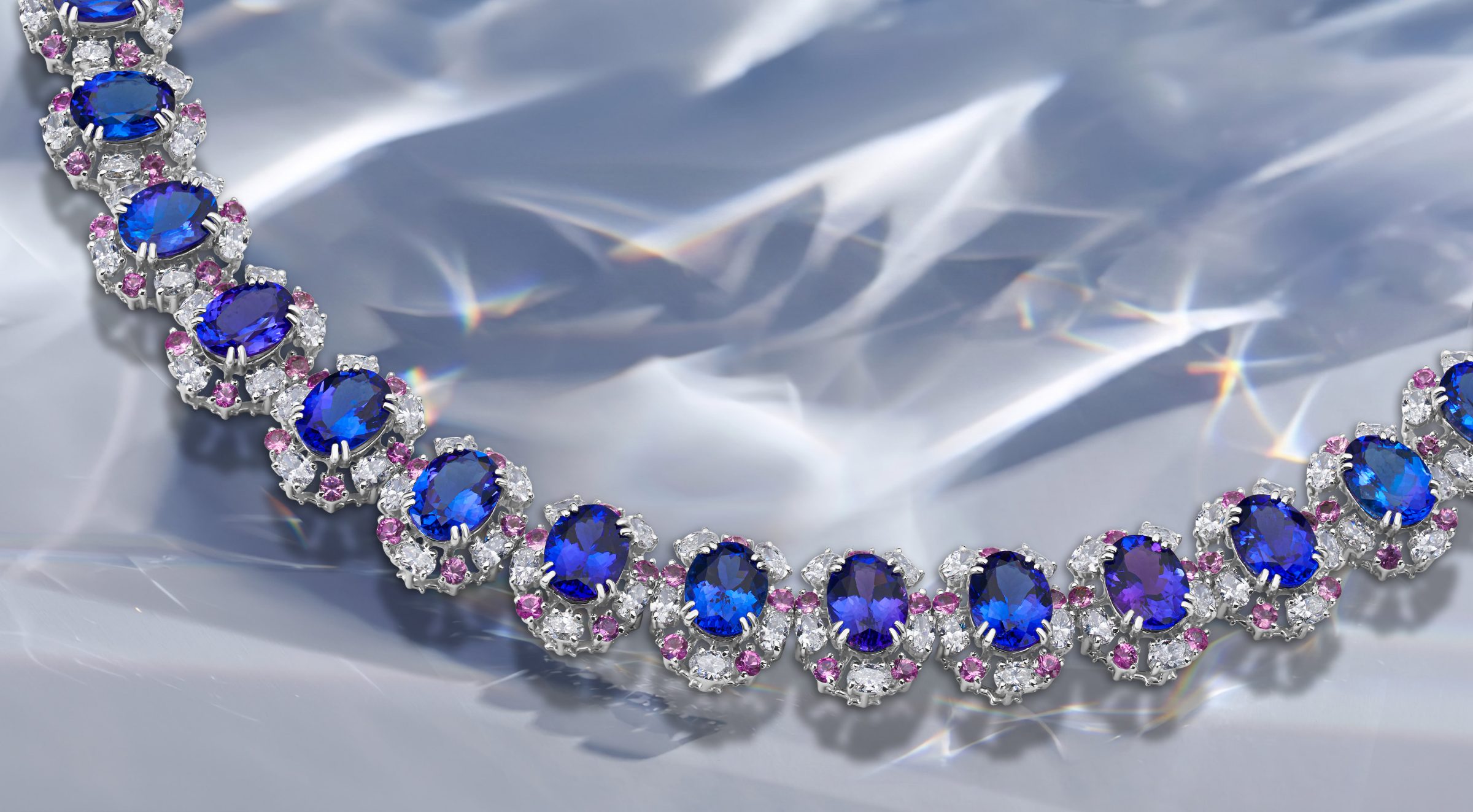 Blue sapphire and diamond necklace with pink accents — fine jewelry photography by Figueroa, Miami
